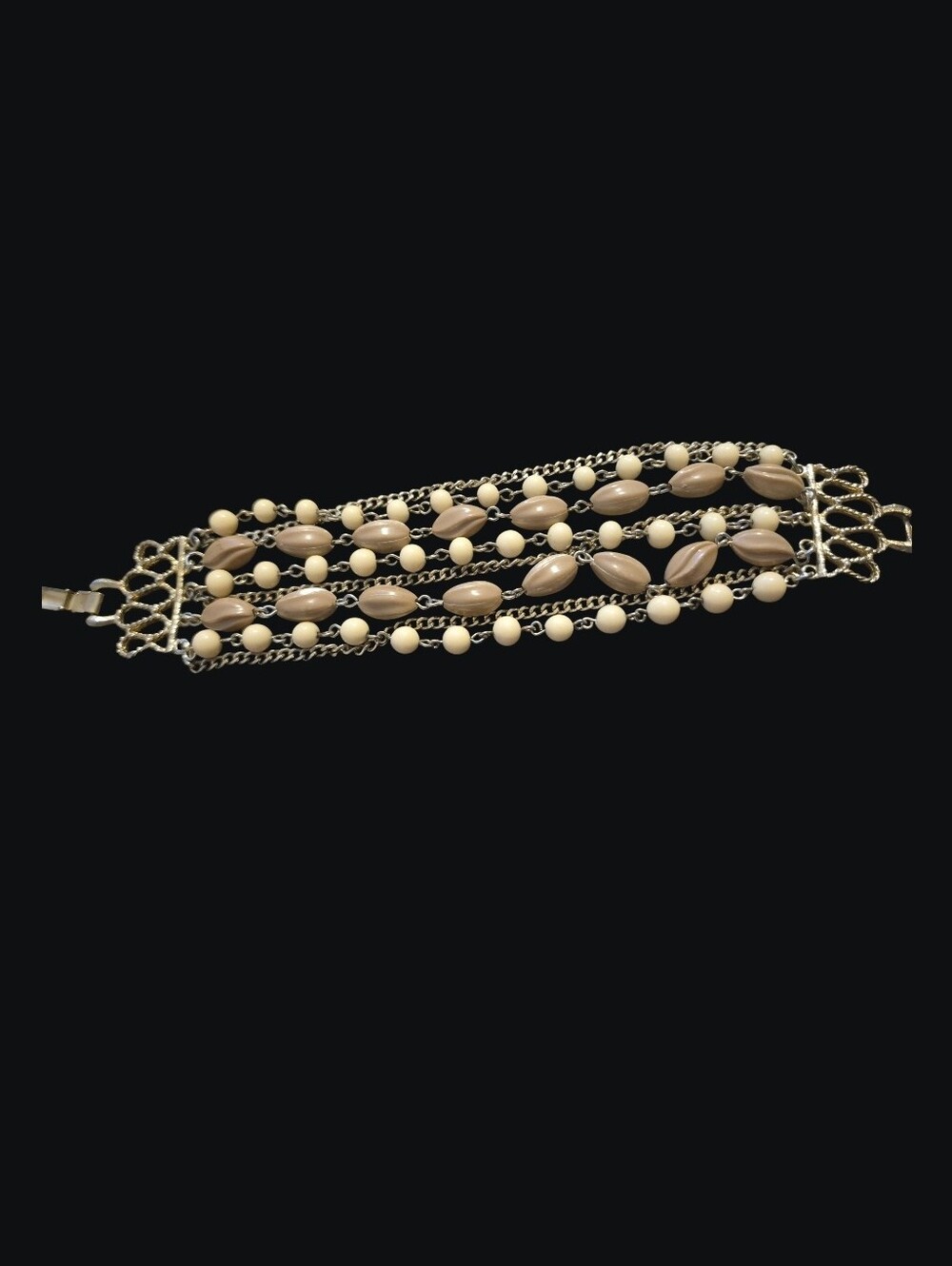Multi-Strand Beige and Cream Beaded Bracelet with Gold Chains